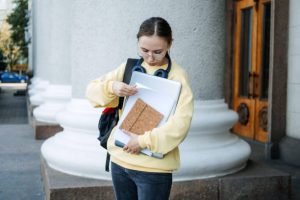 A person reviewing their credit report for signs of identity theft, ensuring their financial security.