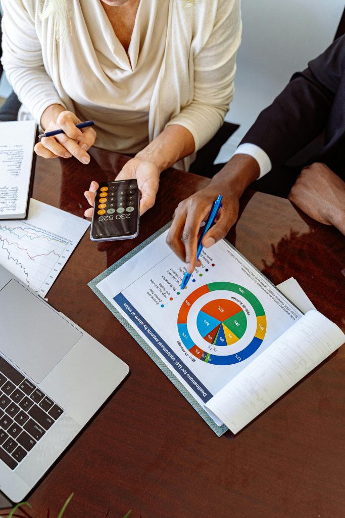 A financial advisor providing expert credit counseling to a client, offering personalized strategies for debt relief and credit score improvement.